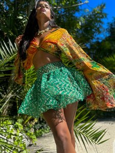 electric emerald mini skirt