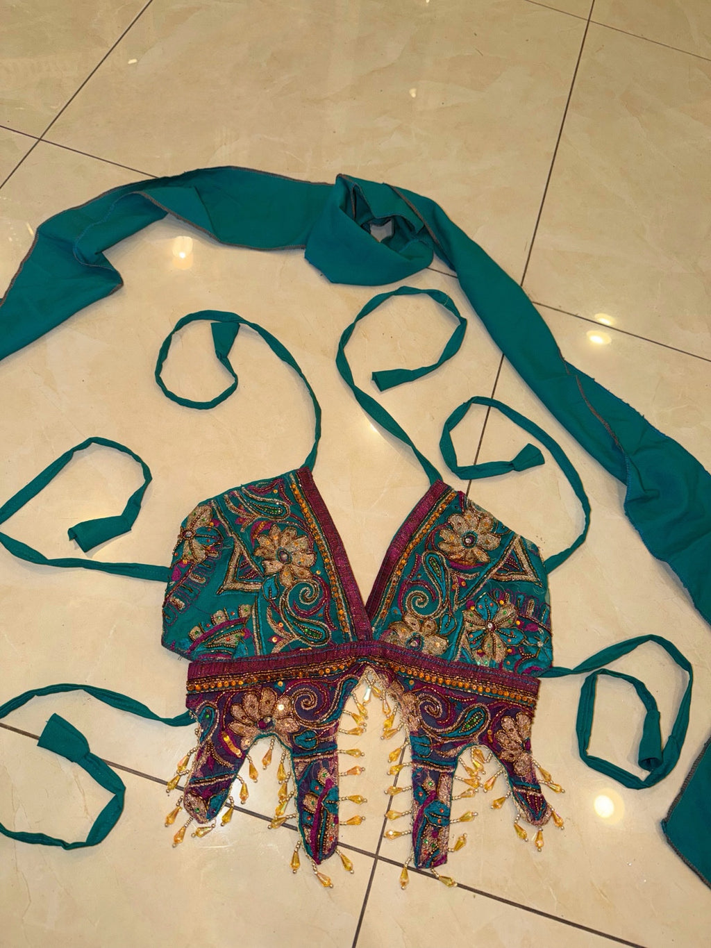 Blue Lotus Butterfly Top with gold-toned floral embellishments, beaded fringe, teal ties, and matching separate scarf