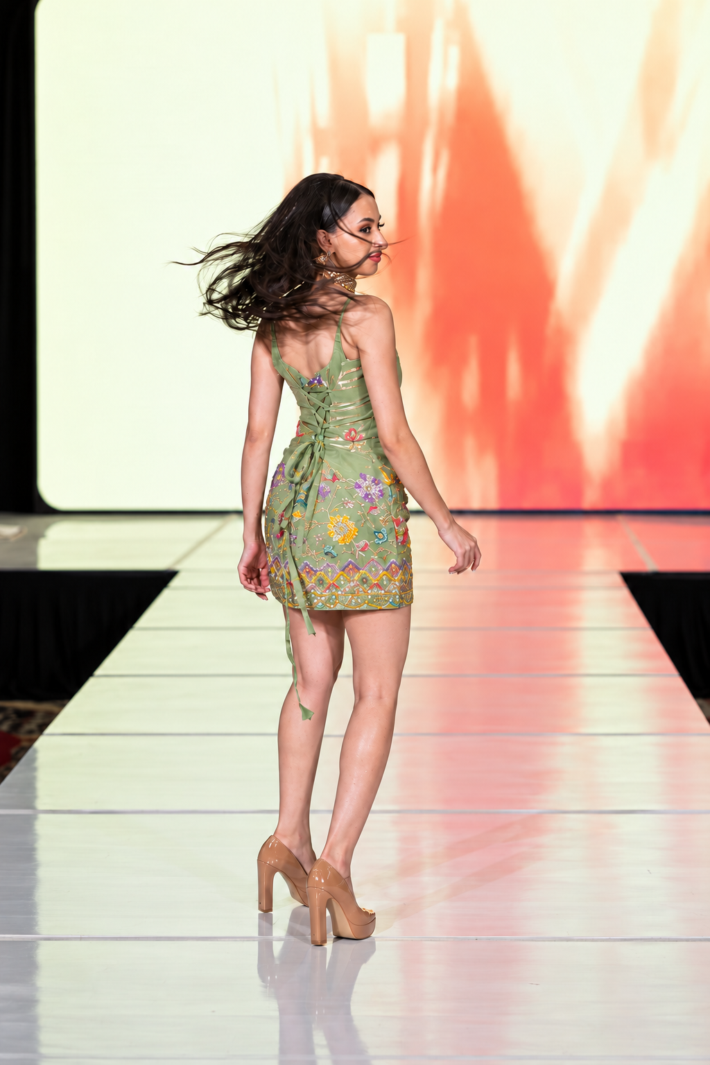Back view of Sage Princess Mini Dress with lace-up detail