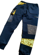 Load image into Gallery viewer, Golden Teacher Patchwork Pants
