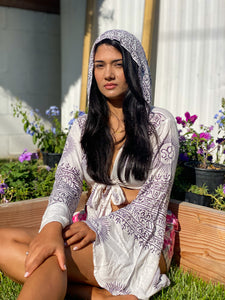 White Sanskrit top with black writing