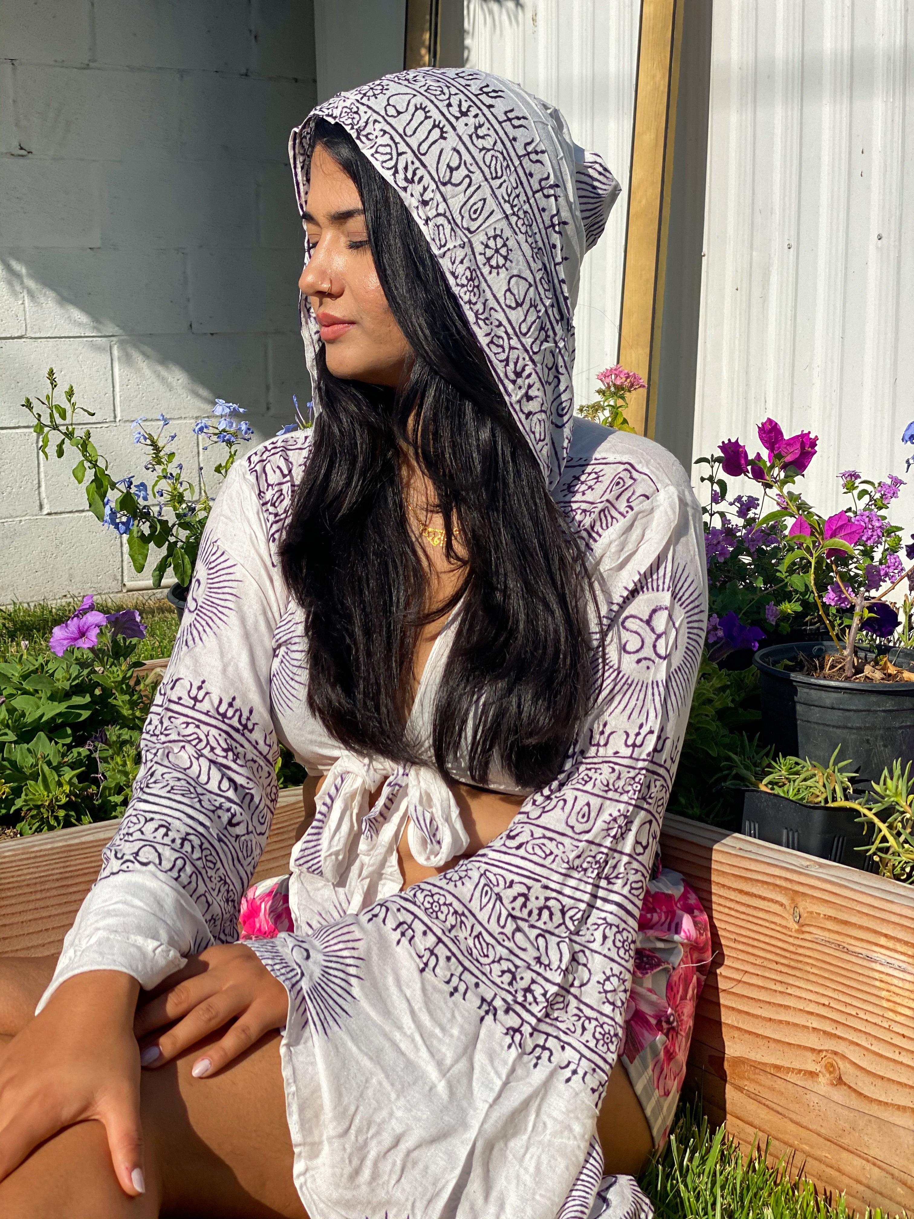 White Sanskrit top with black writing