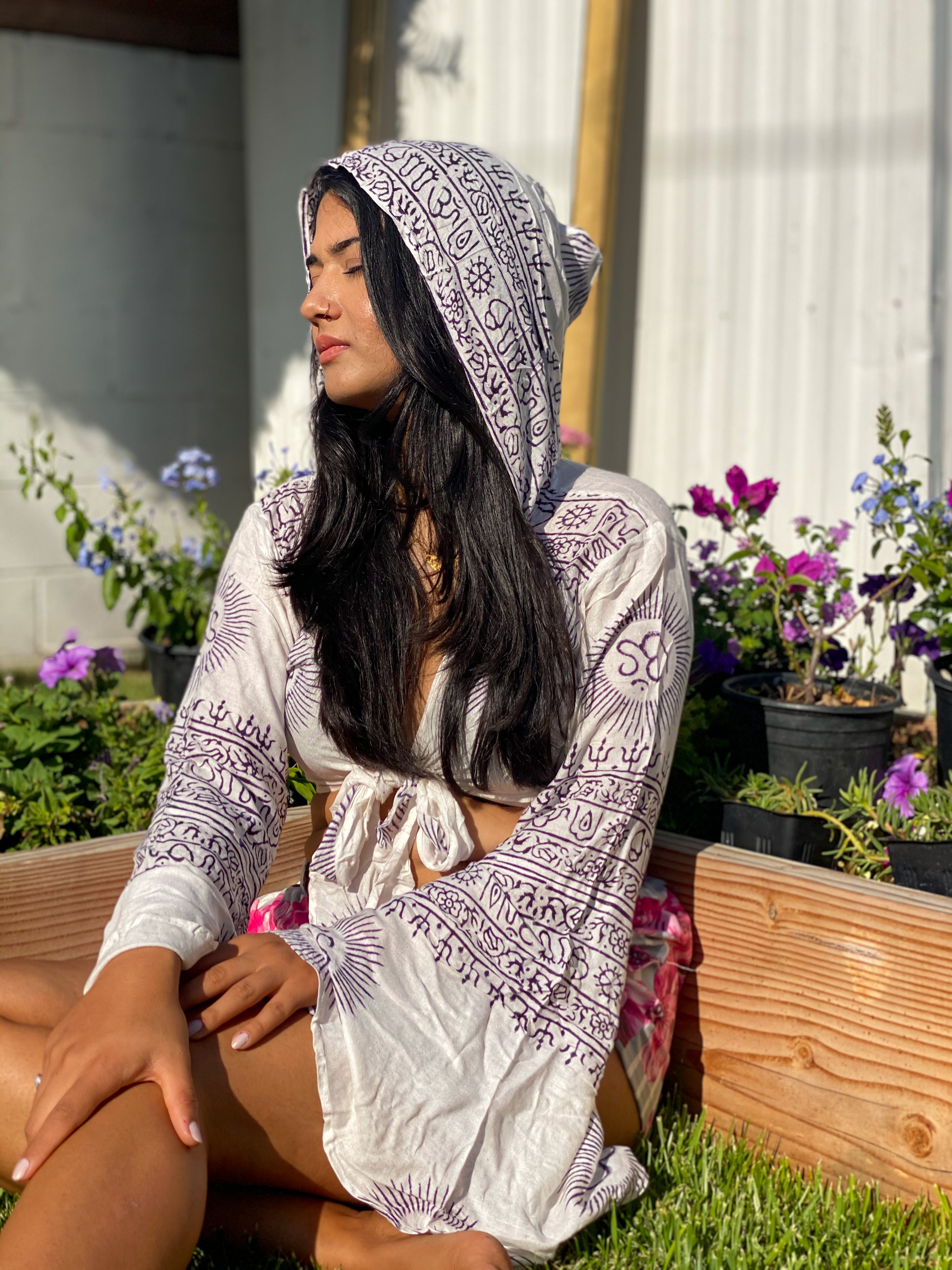 White Sanskrit top with black writing